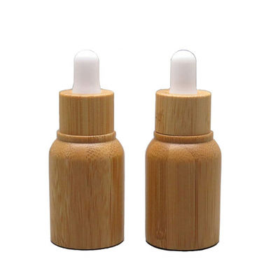 De Fles van de glasetherische olie met Zorg de Veilig voor kinderen van de de Luxehuid van het Bamboedruppelbuisje