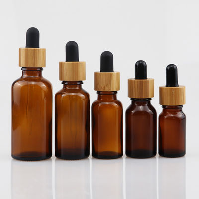 100ml de Kosmetische Fles van het etherische olieglas met Bruine de Zorghuid van het Bamboedruppelbuisje