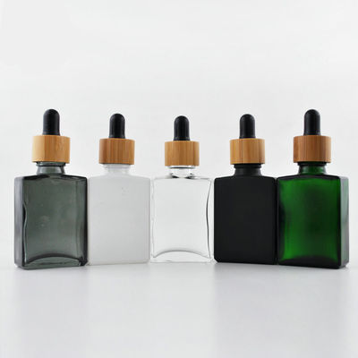 Het Druppelbuisjefles van het rechthoek Kosmetische 30ml Glas met Bamboe GLB voor Etherische olie