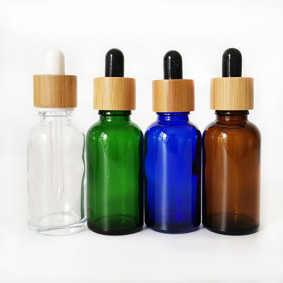 De Fles van de glasetherische olie met Kleine de oliefles Veilig voor kinderen van het Bamboedruppelbuisje
