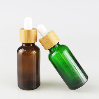 De Fles van de glasetherische olie met Kleine de oliefles Veilig voor kinderen van het Bamboedruppelbuisje